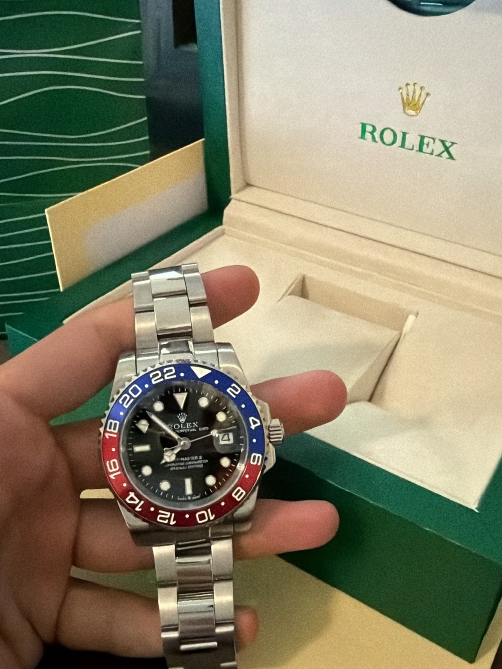 Rolex GMT-Master II Stainless Steel Watch with Blue and Red Bezel and Black Dial